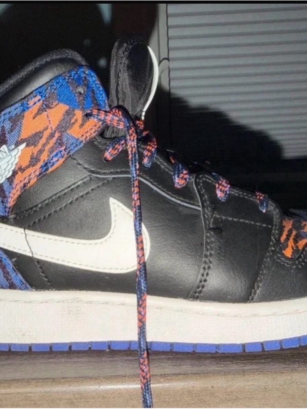Jordan Kids Black Sneakers with White Swoosh and Blue-Orange Accents